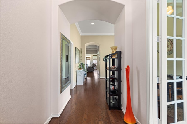 25019 Bahme Springs Ln, Porter, TX 77365 - hallway featuring arched walkways, dark wood-style flooring, crown molding, baseboards, and recessed lighting