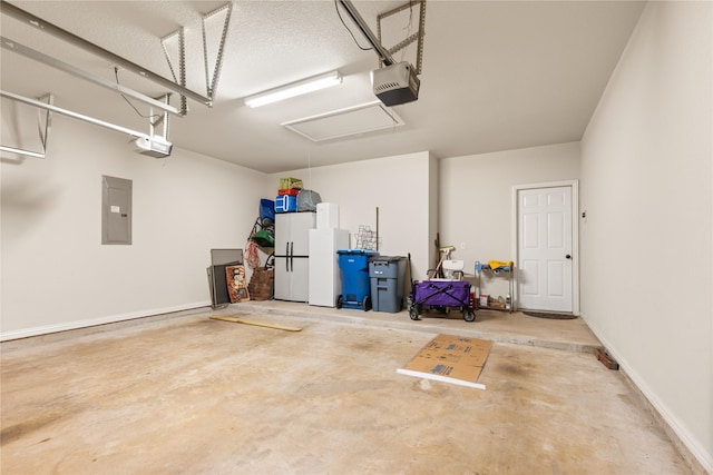25019 Bahme Springs Ln, Porter, TX 77365 - garage featuring electric panel, a garage door opener, freestanding refrigerator, and baseboards