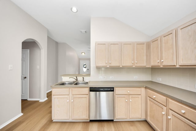 1805 Coronel St, Alvin, TX 77511 - kitchen featuring stainless steel dishwasher, light brown cabinetry, a sink, and vaulted ceiling