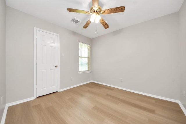 1805 Coronel St, Alvin, TX 77511 - spare room featuring light wood finished floors, baseboards, and a ceiling fan