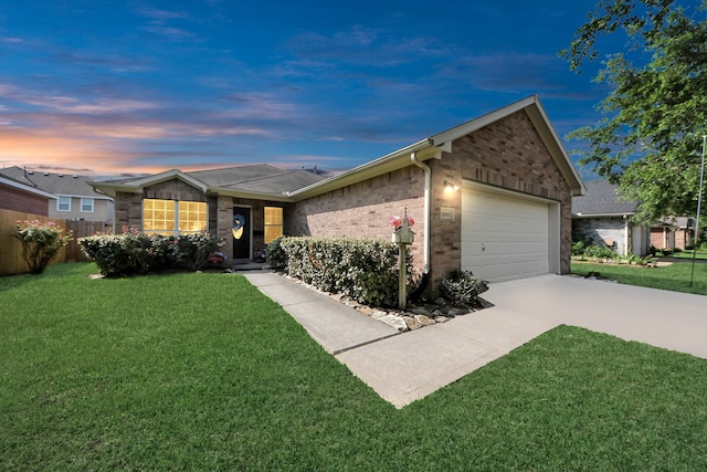 1805 Coronel St, Alvin, TX 77511 - ranch-style house featuring driveway, a garage, and brick siding