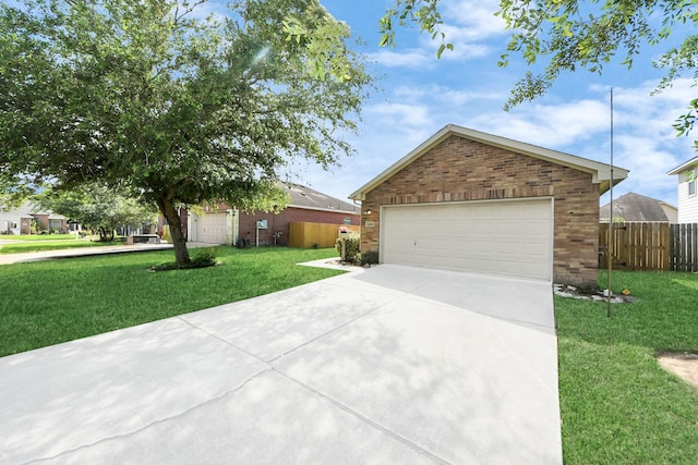 1805 Coronel St, Alvin, TX 77511 - view of front facade with brick siding and a garage