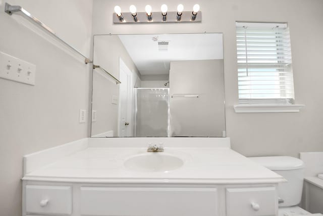 1805 Coronel St, Alvin, TX 77511 - full bathroom with toilet, vanity, and a shower with door