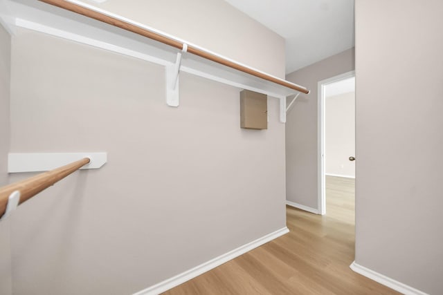 1805 Coronel St, Alvin, TX 77511 - spacious closet featuring light wood-type flooring