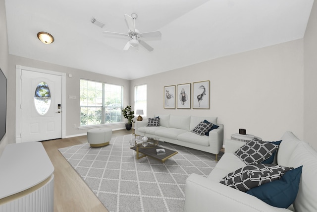 1805 Coronel St, Alvin, TX 77511 - living room with a ceiling fan, wood finished floors, and baseboards