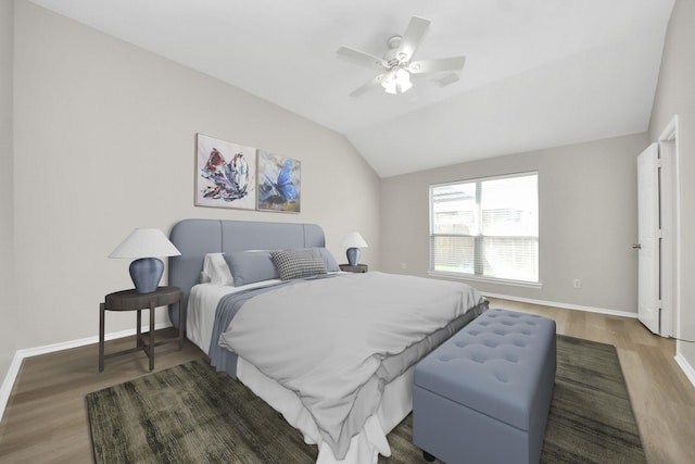 1805 Coronel St, Alvin, TX 77511 - bedroom with lofted ceiling, wood finished floors, baseboards, and a ceiling fan