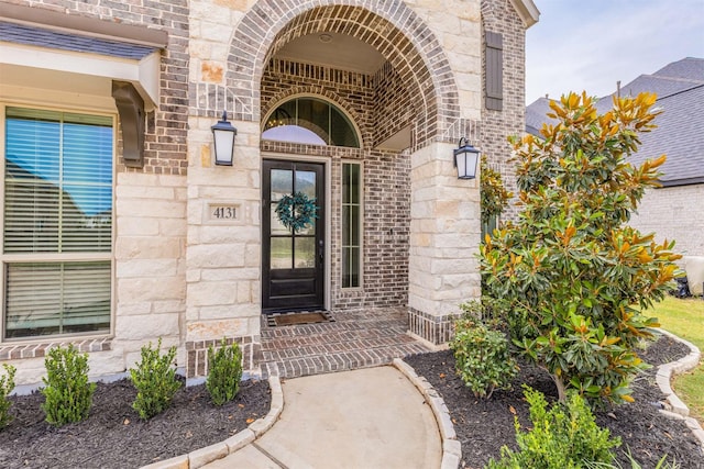 4131 Creek Shore Ln, Fulshear, TX 77441 - doorway to property with brick siding and stone siding