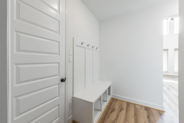 4131 Creek Shore Ln, Fulshear, TX 77441 - mudroom featuring light wood-type flooring and baseboards