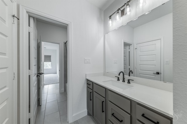 4131 Creek Shore Ln, Fulshear, TX 77441 - bathroom with vanity, tile patterned floors, and baseboards