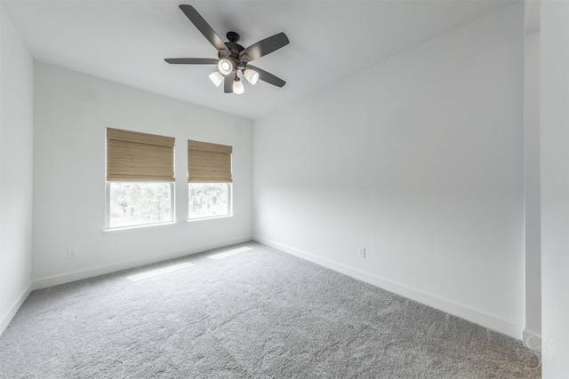 4131 Creek Shore Ln, Fulshear, TX 77441 - spare room with carpet floors, baseboards, and ceiling fan
