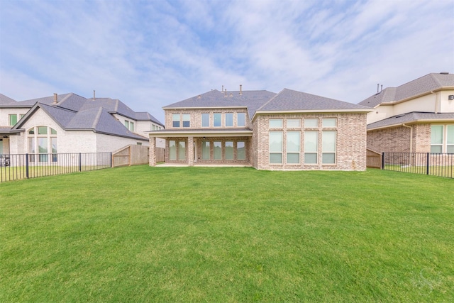 4131 Creek Shore Ln, Fulshear, TX 77441 - back of property featuring brick siding