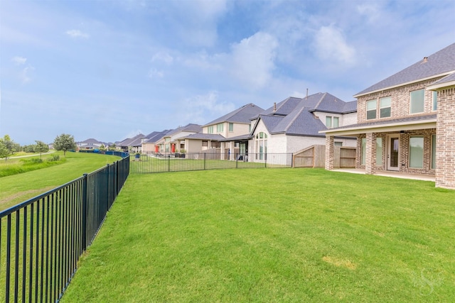 4131 Creek Shore Ln, Fulshear, TX 77441 - view of yard featuring a residential view and a patio area