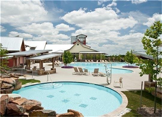 4131 Creek Shore Ln, Fulshear, TX 77441 - community pool featuring a patio and a gazebo