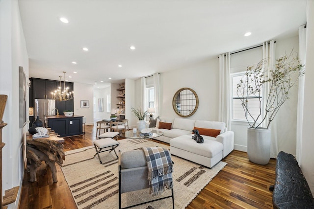 1514 31st St, Galveston, TX 77550 - living room featuring dark wood finished floors, healthy amount of natural light, a chandelier, and recessed lighting