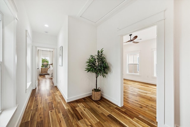 1514 31st St, Galveston, TX 77550 - corridor with wood-type flooring, baseboards, and recessed lighting