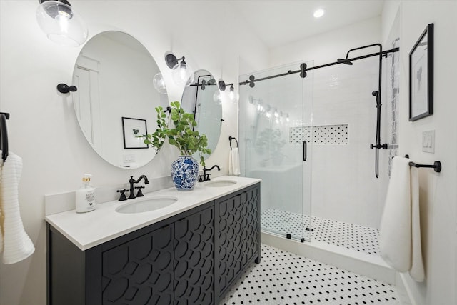 1514 31st St, Galveston, TX 77550 - bathroom with a stall shower, double vanity, and recessed lighting