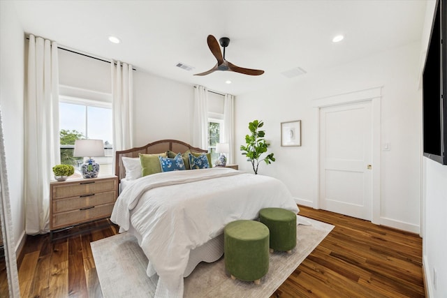 1514 31st St, Galveston, TX 77550 - bedroom featuring multiple windows, dark wood-style flooring, ceiling fan, and recessed lighting