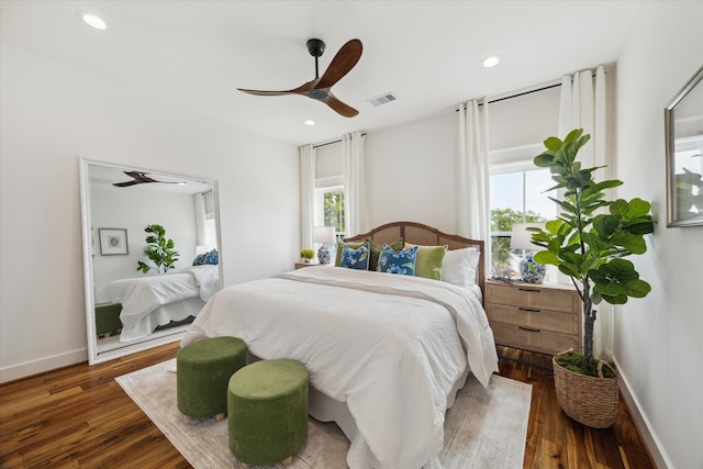 1514 31st St, Galveston, TX 77550 - bedroom featuring multiple windows, wood finished floors, recessed lighting, and baseboards
