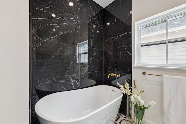1514 31st St, Galveston, TX 77550 - full bathroom with a soaking tub