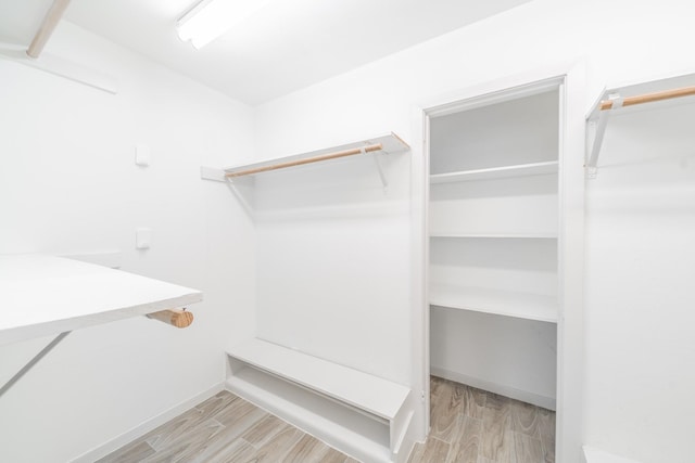 5229 W 43rd St, Houston, TX 77092 - spacious closet featuring wood finished floors