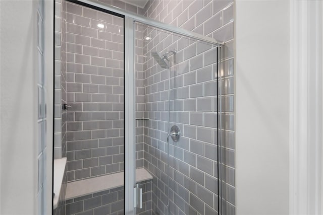 6026 Lake Bridge Ln, Manvel, TX 77578 - bathroom featuring a shower stall