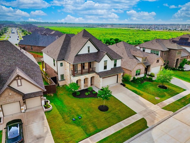 6026 Lake Bridge Ln, Manvel, TX 77578 - aerial perspective of suburban area