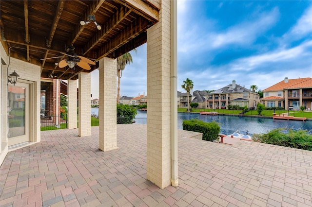 14330 Ayers Rock Rd, Sugar Land, TX 77498 - view of patio with a ceiling fan, a water view, and a residential view