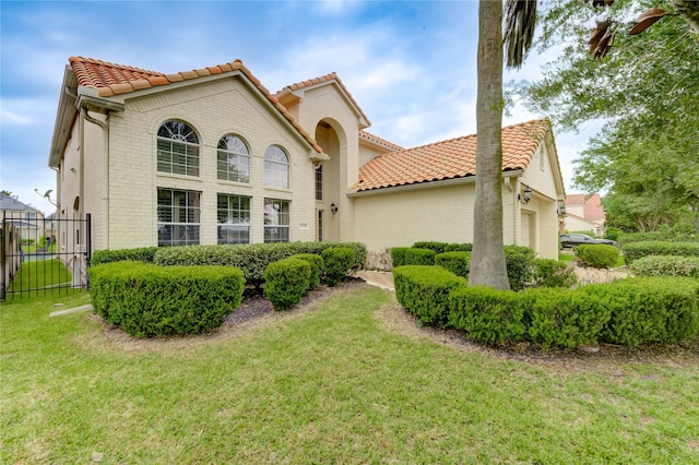 14330 Ayers Rock Rd, Sugar Land, TX 77498 - rear view of property featuring a tiled roof and brick siding