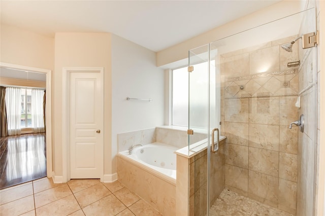 14330 Ayers Rock Rd, Sugar Land, TX 77498 - bathroom with a stall shower, a jetted tub, and tile patterned flooring
