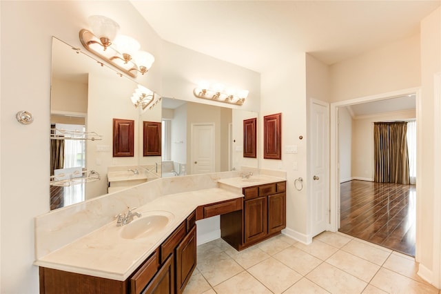 14330 Ayers Rock Rd, Sugar Land, TX 77498 - full bathroom with double vanity, tile patterned flooring, and baseboards