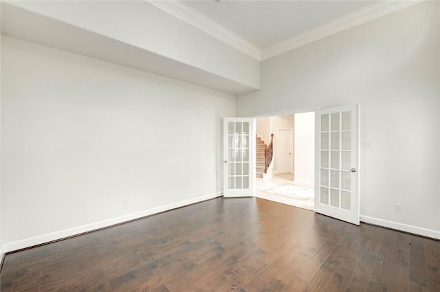 14330 Ayers Rock Rd, Sugar Land, TX 77498 - unfurnished room with french doors, crown molding, dark wood-style flooring, and baseboards