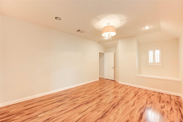 14330 Ayers Rock Rd, Sugar Land, TX 77498 - empty room featuring wood finished floors, vaulted ceiling, baseboards, and recessed lighting