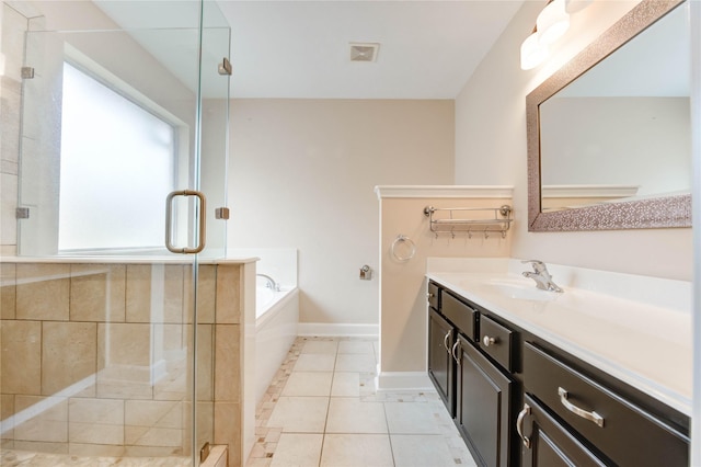 14330 Ayers Rock Rd, Sugar Land, TX 77498 - bathroom with baseboards, vanity, a garden tub, a stall shower, and tile patterned floors