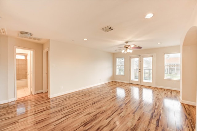14330 Ayers Rock Rd, Sugar Land, TX 77498 - spare room featuring light wood-style flooring, a ceiling fan, baseboards, and recessed lighting