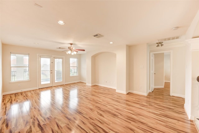 14330 Ayers Rock Rd, Sugar Land, TX 77498 - empty room with plenty of natural light, light wood-type flooring, a ceiling fan, baseboards, and recessed lighting