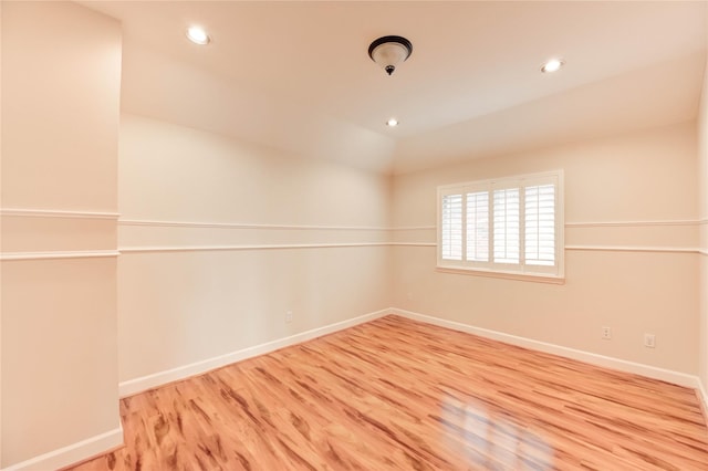 14330 Ayers Rock Rd, Sugar Land, TX 77498 - empty room featuring wood finished floors, baseboards, and recessed lighting