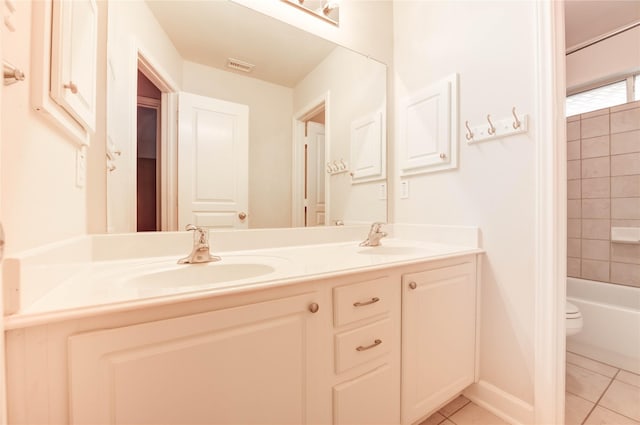 14330 Ayers Rock Rd, Sugar Land, TX 77498 - full bathroom with tile patterned floors, double vanity, toilet, and shower / bath combination