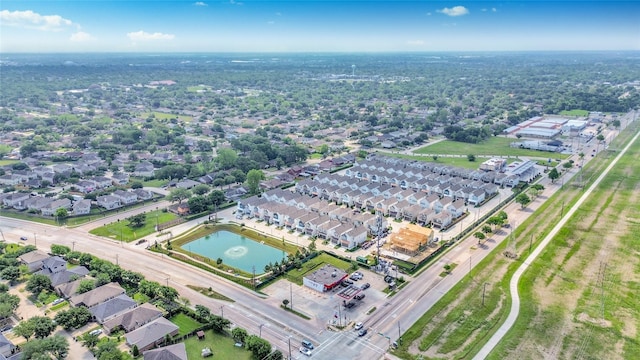 12808 Cozumel Ln, Houston, TX 77045 - aerial view of property and surrounding area featuring nearby suburban area and a large body of water