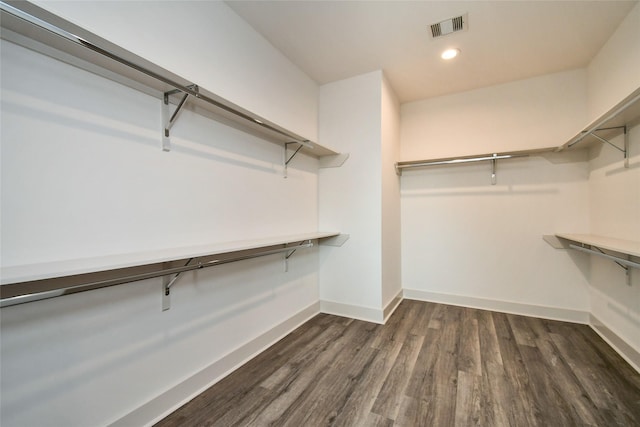 12808 Cozumel Ln, Houston, TX 77045 - spacious closet featuring dark wood-style flooring