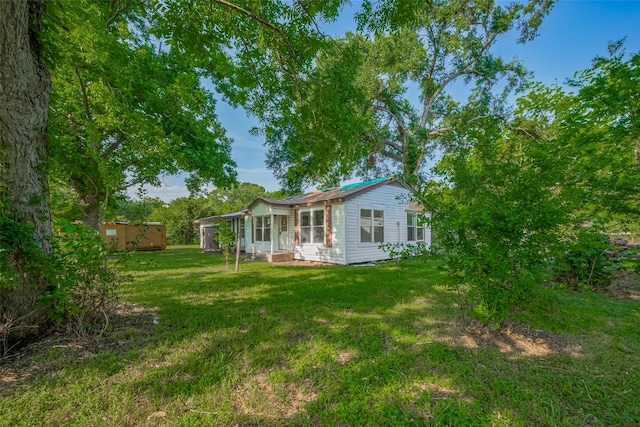 13326 Sundale Rd, Houston, TX 77038 - rear view of house featuring a yard