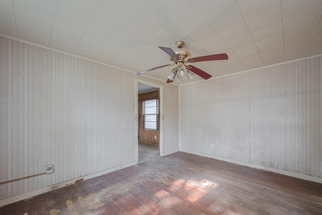 13326 Sundale Rd, Houston, TX 77038 - unfurnished room with hardwood / wood-style flooring, a ceiling fan, and baseboards
