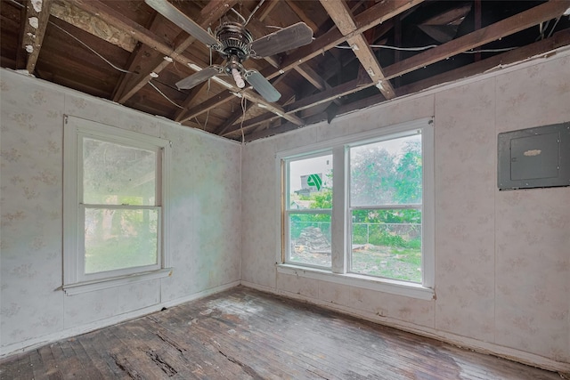 13326 Sundale Rd, Houston, TX 77038 - spare room with electric panel, hardwood / wood-style floors, plenty of natural light, and ceiling fan