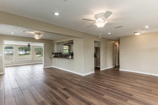 280 Crestmont St, Point Blank, TX 77364 - unfurnished living room with a ceiling fan, dark wood finished floors, baseboards, a sink, and recessed lighting
