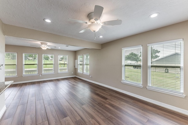 280 Crestmont St, Point Blank, TX 77364 - unfurnished room featuring ceiling fan, baseboards, dark wood-type flooring, a textured ceiling, and recessed lighting