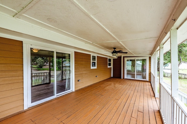 280 Crestmont St, Point Blank, TX 77364 - unfurnished sunroom featuring healthy amount of natural light and a ceiling fan