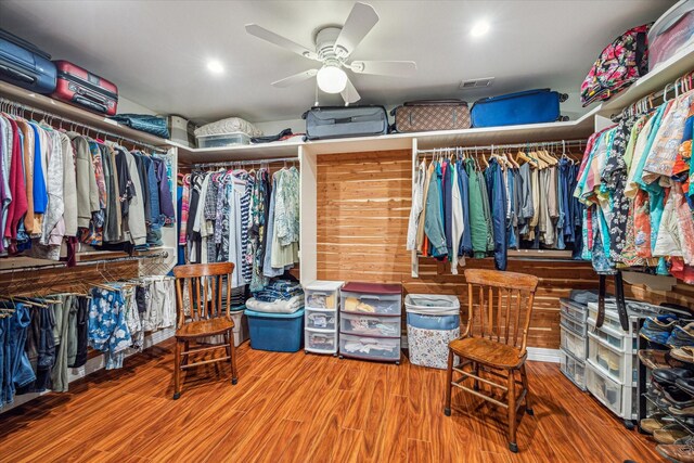 7506 Dearborn St, Houston, TX 77055 - walk in closet featuring wood finished floors and ceiling fan