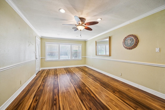 7506 Dearborn St, Houston, TX 77055 - empty room featuring a ceiling fan, crown molding, baseboards, wood finished floors, and a textured ceiling