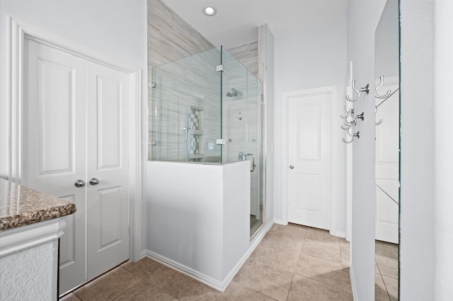 2807 Hadley Spgs, Spring, TX 77386 - full bathroom featuring a shower stall, baseboards, and tile patterned floors