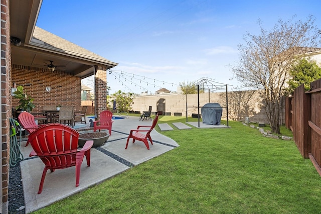 2807 Hadley Spgs, Spring, TX 77386 - view of yard featuring ceiling fan, a patio, an outdoor fire pit, and outdoor dining space