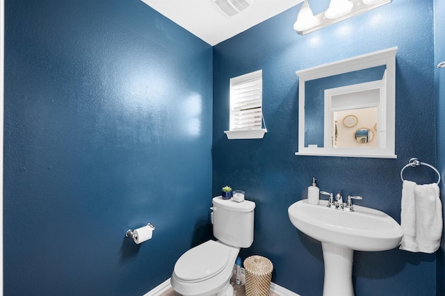 2807 Hadley Spgs, Spring, TX 77386 - half bathroom with toilet and baseboards